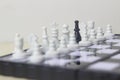 Simple Photo illustration for War, battle or politic situation concept, betrayer beyond the soldier, plastic magnetic small chess,