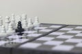 Simple Photo illustration for War, battle or politic situation concept, betrayer beyond the soldier, plastic magnetic small chess,