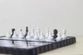 Simple Photo illustration for War, battle or politic situation concept, betrayer beyond the soldier, plastic magnetic small chess, Royalty Free Stock Photo