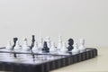 Simple Photo illustration for War, battle or politic situation concept, betrayer beyond the soldier, plastic magnetic small chess,