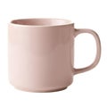 Simple pink ceramic mug for coffee or tea. This calming cup and drinkware with handle on transparent background Royalty Free Stock Photo