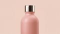 Simple Pink Water Bottle With Silver Cap Against a Plain Background Royalty Free Stock Photo