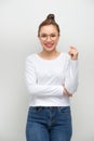 Simple portrait of an asian girl with arms crossed on white background
