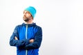 Simple portrait and white background, of a mountaineer man ready to start a challenge in nature