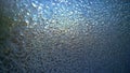 Simple primitive ice pattern on window blue-white color Royalty Free Stock Photo