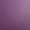 Background with a textured purple leather appearance Royalty Free Stock Photo