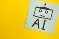 Simple robot drawing with acronym Ai on yellow background