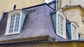 The simple roof with windows in the capital of France in Paris