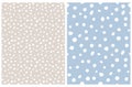 White Hand Drawn Brush Dots Isolated on a Pale Blue and Pastel Pink Background. Royalty Free Stock Photo