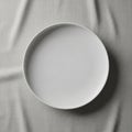 A simple round white ceramic plate Royalty Free Stock Photo