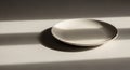 A simple, round white ceramic plate Royalty Free Stock Photo