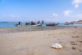 Simple rural fishermen are preparing for fishing. Boats in the water on the coast of the island in the Arabian Sea. island of Soco Royalty Free Stock Photo