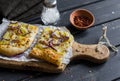 Simple rustic crispy pie with potatoes, cheese and red onion. Royalty Free Stock Photo