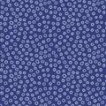 Simple seamless floral pattern. Small tiny flowers on a dark background. Blue and white spring print for textiles. Vector