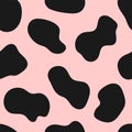 Simple seamless pattern with cow spots. Cute girly print. Royalty Free Stock Photo