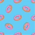 Simple seamless pattern with donuts on blue background. Royalty Free Stock Photo