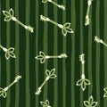 Simple seamless pattern with doodle keys stylized ornament. White and green colored elements on stripped background