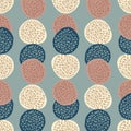Simple seamless pattern with dotted circle ornament. Pastel blue background with navy, coral and light elements Royalty Free Stock Photo