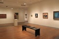 Simple setting, with comfortable benches and artwork on stark walls,Portland Art Museum, Maine,2016