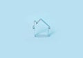 Simple shape of small house isolated on blue background.