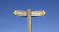 Brexit or Europe - Conceptual signpost with a blue sky background