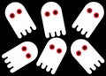 A simple simplified outline shapes of six white ghost apparitions black backdrop Royalty Free Stock Photo