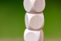 Simple small blank empty plain wooden cubes structure part up close, cube tower macro shallow depth of field, object detail