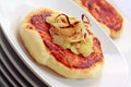 Simple small pizza (pizzette) with onion Royalty Free Stock Photo