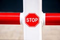 Simple small red stop sign, closeup, detail. Car parking spot octagon stop symbol up close, object, nobody. Stopping, slowing down Royalty Free Stock Photo