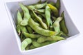 Simple small serving of Edamame Peas in Stylish White Bowl