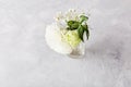 Simple small white pastel bouquet of eustoma, rose, gypsophila. Biophilic interior, cozy aesthetic table at home