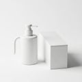 Simple soap dispenser and rectangular block on white background Royalty Free Stock Photo