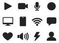 Simple solid user interface icons set featuring play, video, microphone, and heart symbols for digital applications and Royalty Free Stock Photo