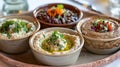 Simple spread of hummus, olives, and herbs Royalty Free Stock Photo