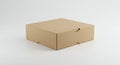 A simple square cardboard box on a white surface with a pull-out drawer feature. The Royalty Free Stock Photo