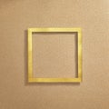 A simple square gold frame on a sandy background. Text space. Top view. Minimal style