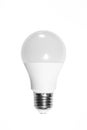 Simple standart form LED energy-saving lamp with E27 screw cap base isolated on white background