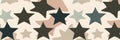 Simple star shapes in muted tones, arranged in a subtle and minimalist pattern Royalty Free Stock Photo
