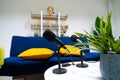 Simple studio room with blue chairs. Podcast media studio to broadcast audio