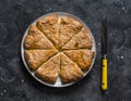 Simple sugar crunchy cookies on a dark background, top view