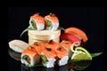 Simple sushi nigiri maki set isolated on black background. Various selection of traditional japanese food Royalty Free Stock Photo