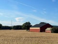 Simple swedish red barn in the middle of a field Royalty Free Stock Photo