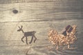 Simple symbols of Father Christmas sleigh arranged from sawdust Royalty Free Stock Photo