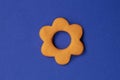 Simple three dimensional sign of flower. Symbol of prosperity, growth concept, growing buissnes. Orange flower icon on blue