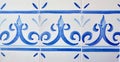 Simple tiles with rustic ornate of white and blue colour. Curly floral ornament. Traditional Spanish wall decoration