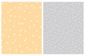 Simple Trangle Vector Patterns. White Triangles on a Pale Yellow and Light Gray Background.
