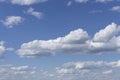 A simple tranquil beautiful S-curved horizon with blue sky and snowy hills