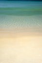 Simple tropical sea and sand vertical