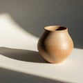 A simple, unglazed clay pot rests Royalty Free Stock Photo