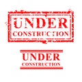 Simple Vector Corrosive 2 style red rubber stamp, Under Construction, Isolated on White Royalty Free Stock Photo